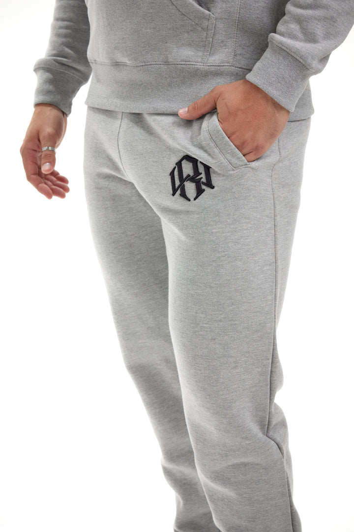 RENOWNED WEAR Premium Heather Grey 400gsm Heavyweight Sweatpants modeled by a young man