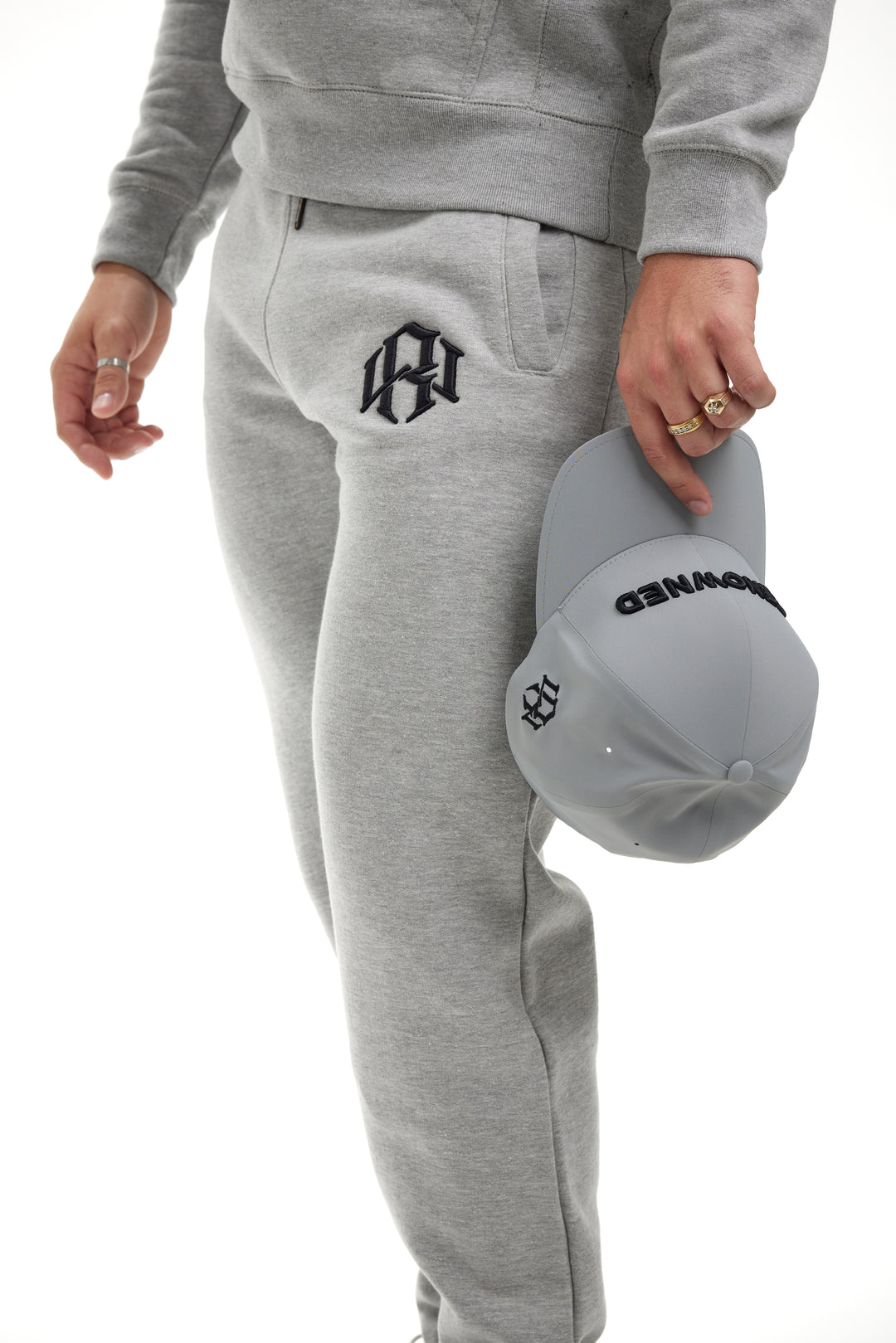 Premium Heather Grey 400gsm Heavyweight Sweatpants modeled by a young man