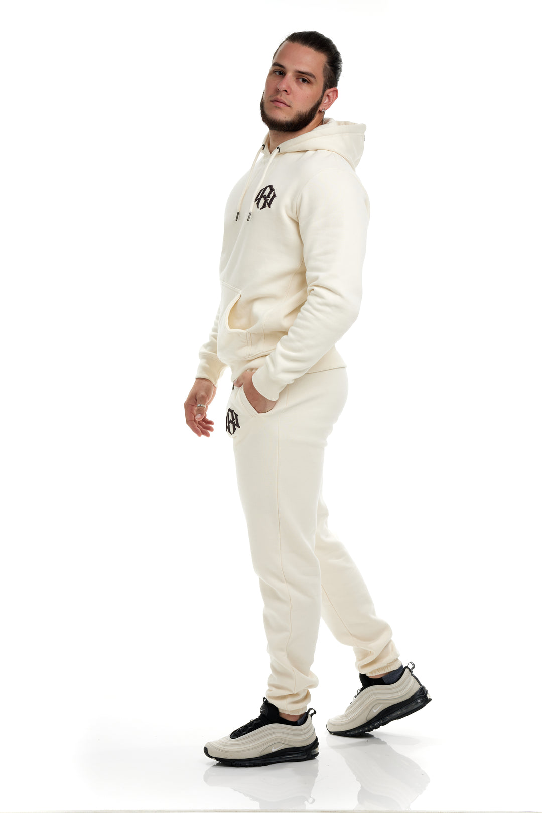 Premium 400gsm Heavyweight Cream Colored Sweatpants modeled by a young man
