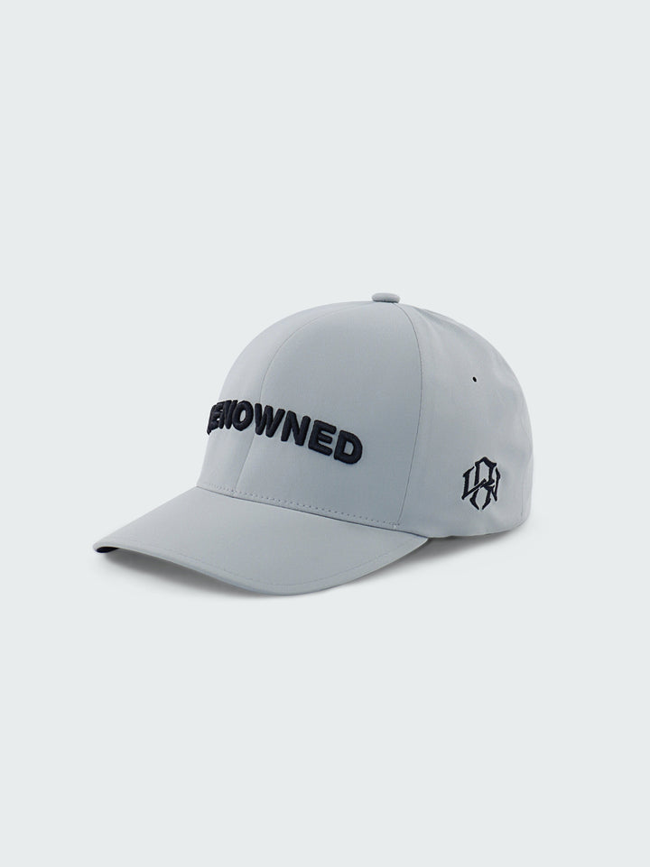 6 panel Silver Cap by RENOWNED WEAR with front Black Lettering 3D Embroidery and side left side logo