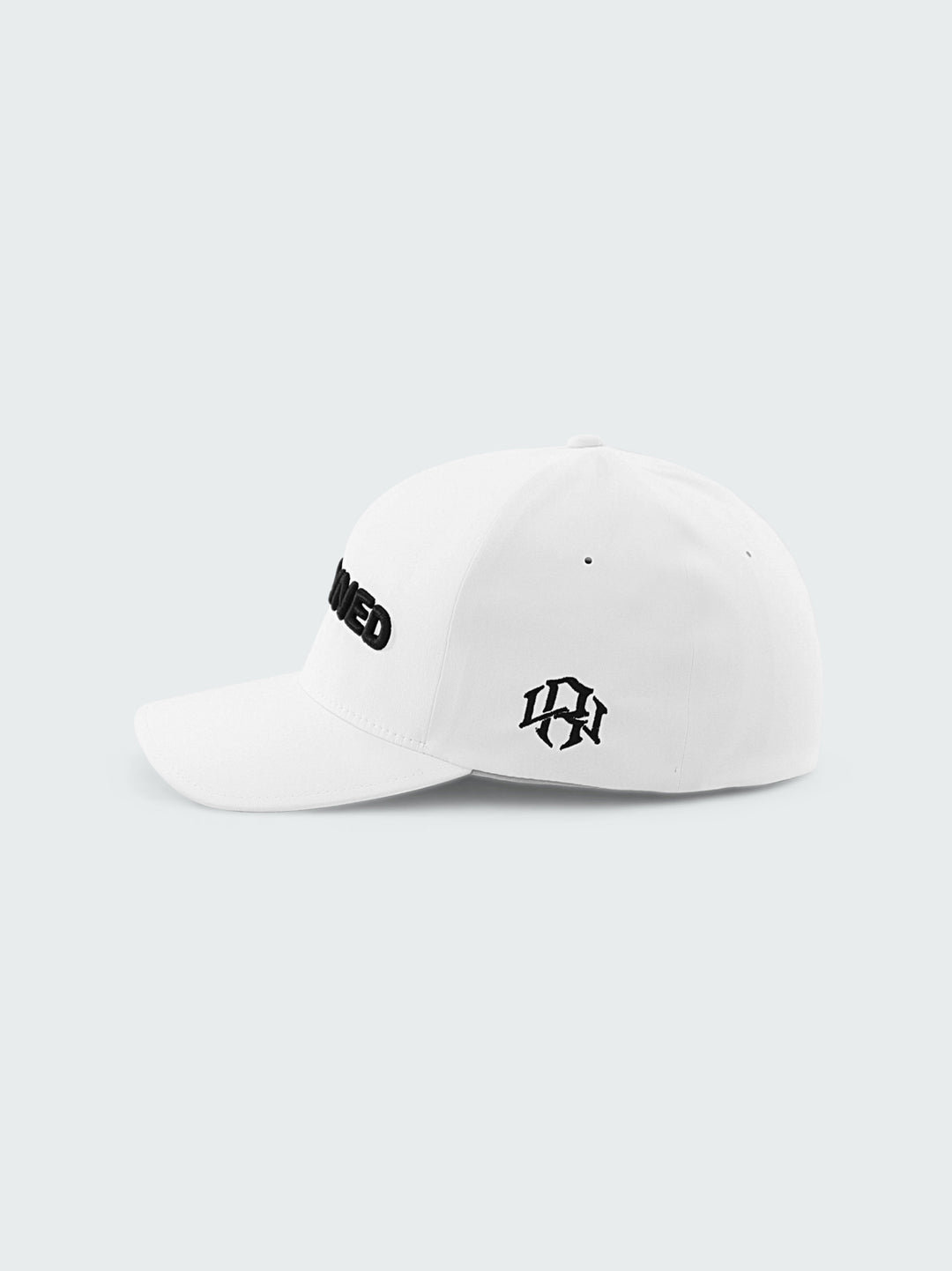 6 panel White Cap by RENOWNED WEAR with front Black Lettering 3D Embroidery and side left side logo.